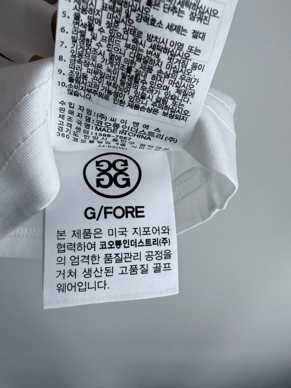 G/FORE Circle Gs Performance Golf Tee White L NWOT Skull No 1 Cares Graphic - Picture 13 of 15